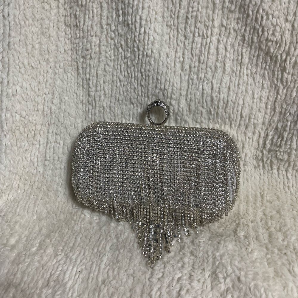 Elegant Silver Clutch with Rhinestone tassels Detailing.